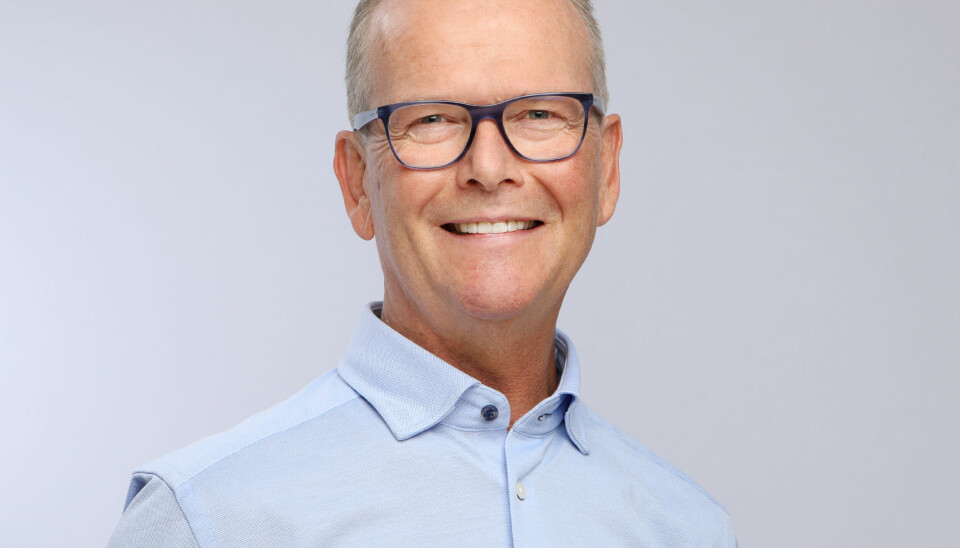 Bildet er av Rolf Søtorp i en lyseblå skjorte med Brannvernforeningens logo.
